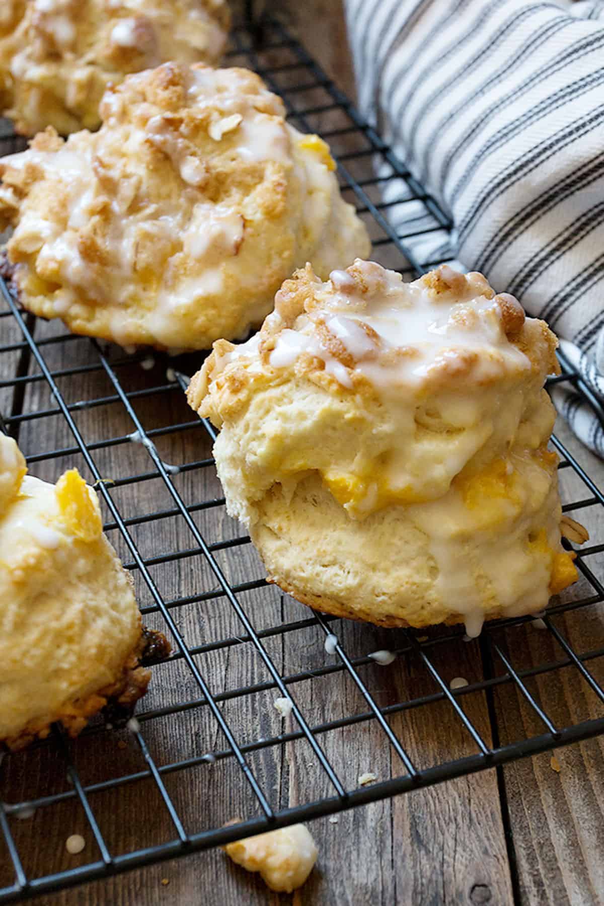peach crisp biscuits on cooling rack