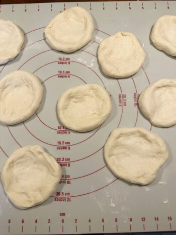 stretching out dough pieces