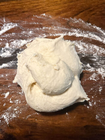 dough on counter before kneading