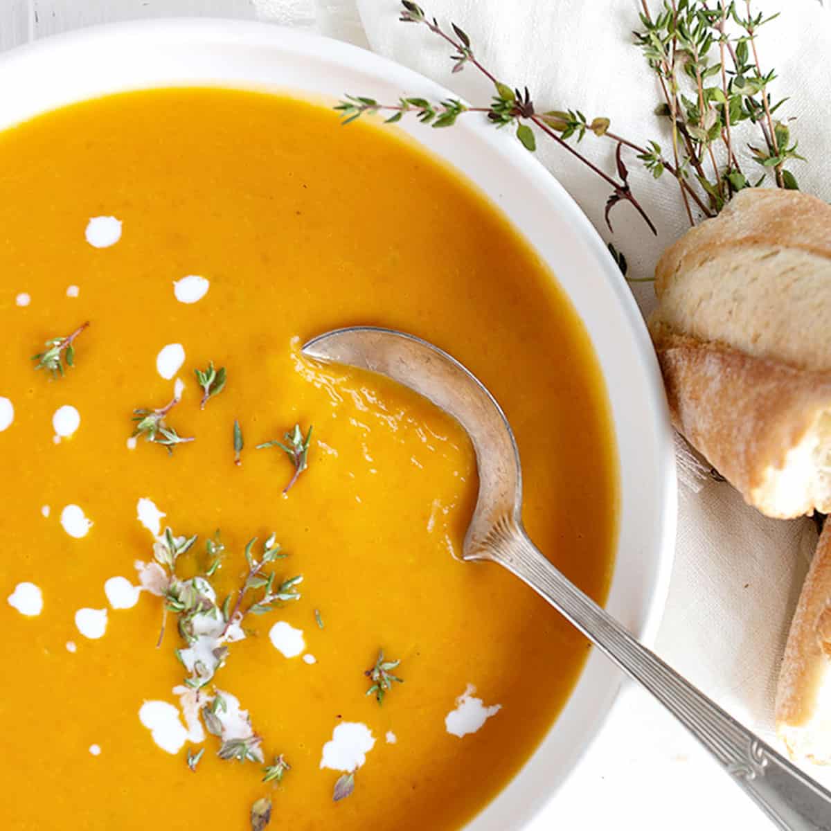 butternut squash soup in white bowl