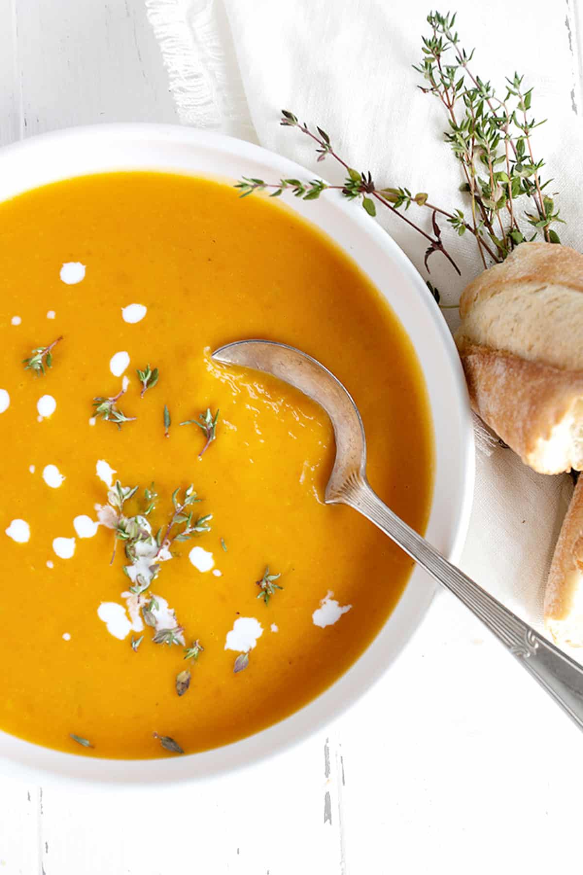 butternut squash soup in white bowl