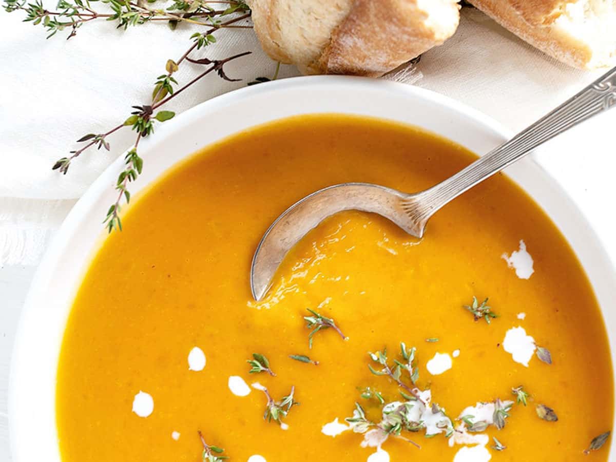 butternut squash soup in white bowl