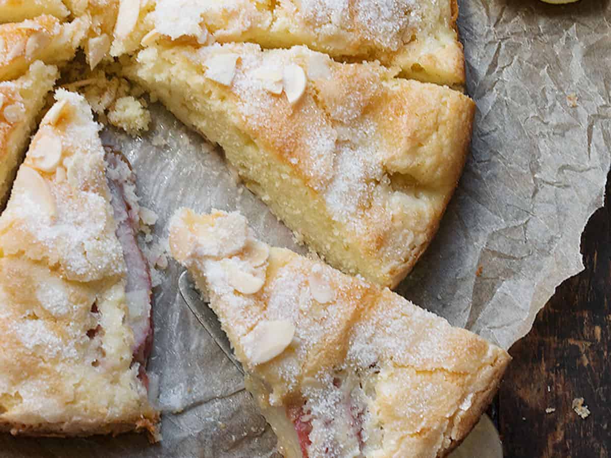 French pear cake sliced on parchment