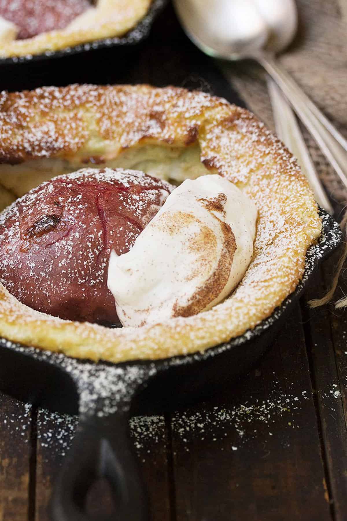 red pear Dutch baby in mini cast iron skillets