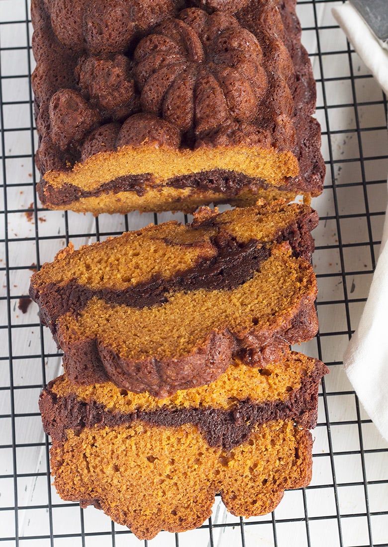 pumpkin loaf marbled with chocolate brownie on cooling rack