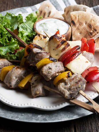 pork souvlaki skewers with halloumi and pepper skewers