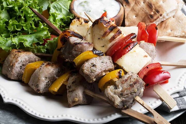 pork souvlaki skewers with halloumi and pepper skewers