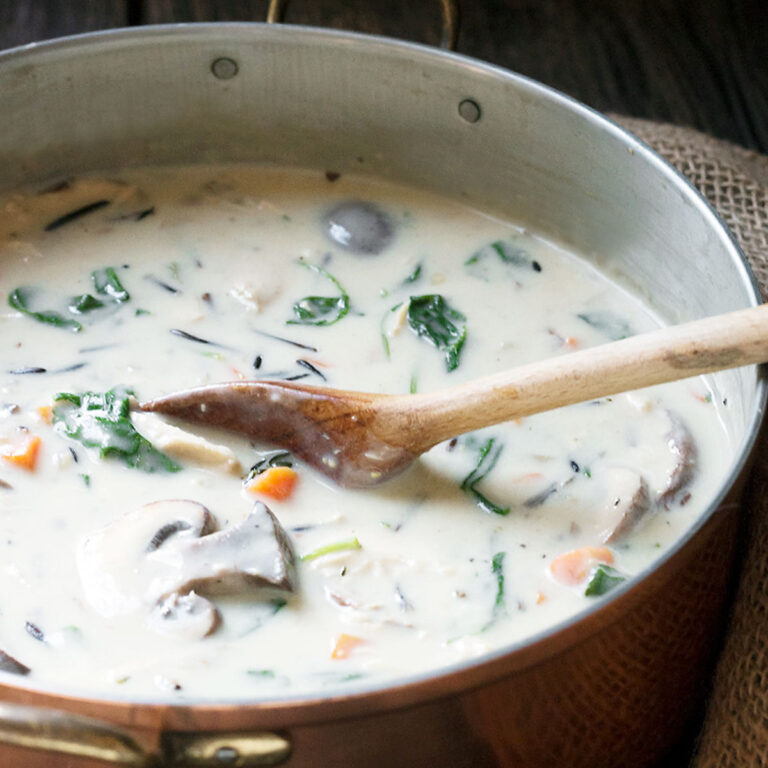 creamy turkey and wild rice soup in copper soup pot