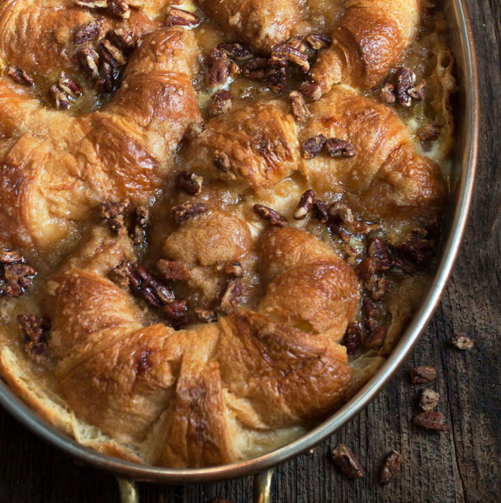 butter pecan croissant bread pudding in baking pan