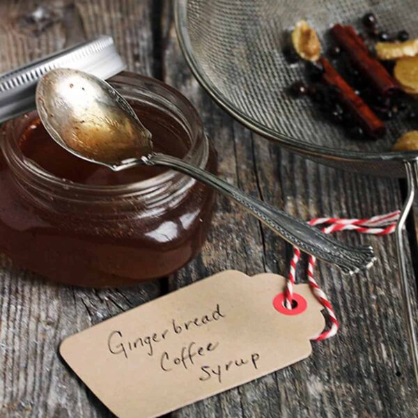 homemade gingerbread coffee syrup in small jar