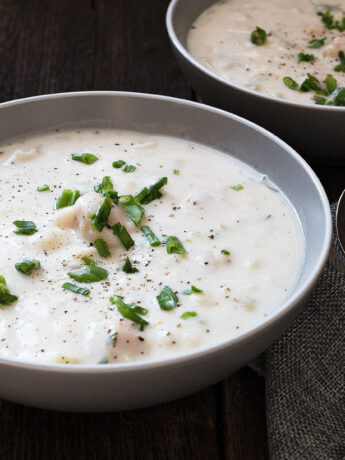 thick and creamy seafood chowder in bowls