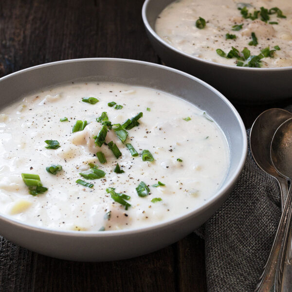 thick and creamy seafood chowder in bowls
