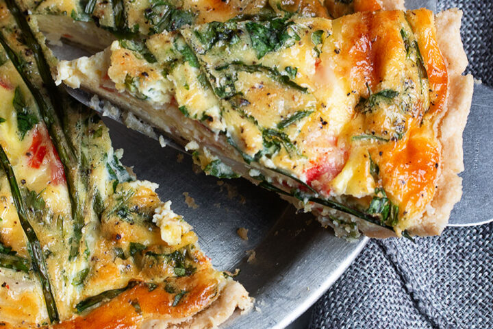 crab quiche sliced in pie dish