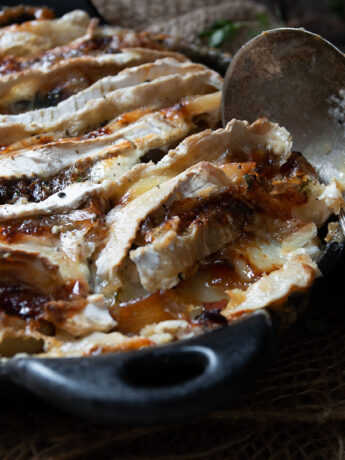 tartiflette in small cast iron skillet