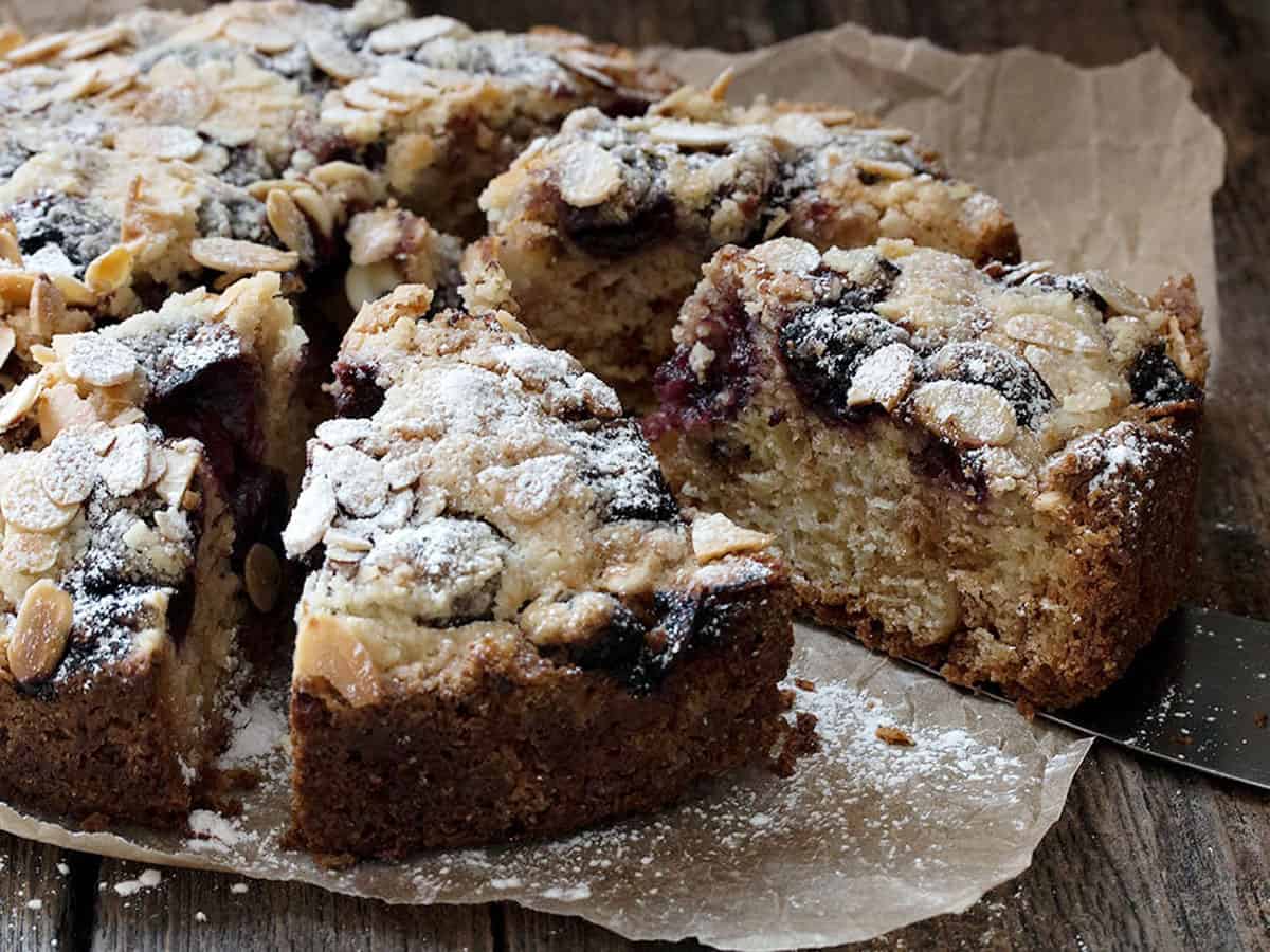 cherry almond coffee cakes sliced on parchment paper