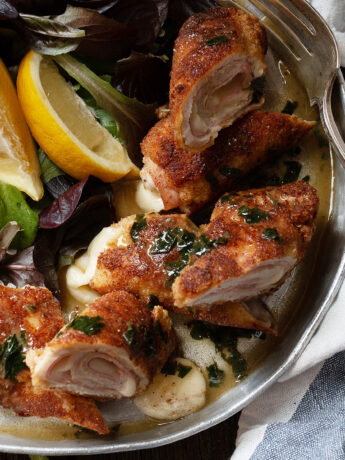 pork cordon bleu on serving platter with fork