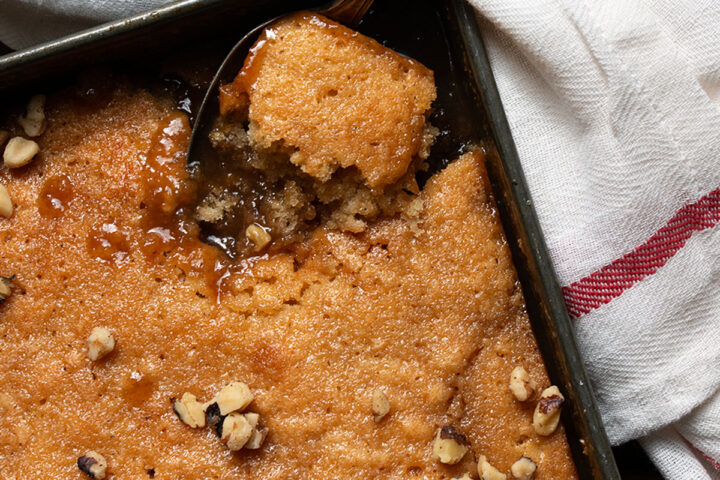 pudding chomeur in pan with spoon