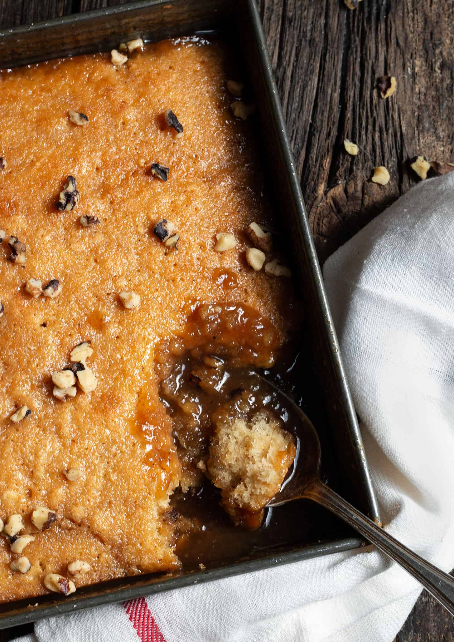 pudding chomeur in pan with spoon