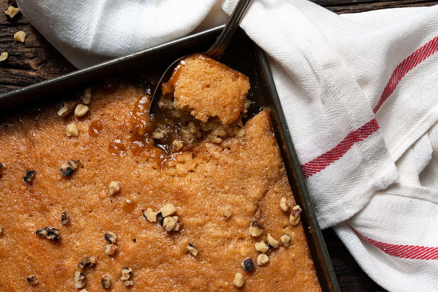 pudding chomeur in pan with spoon