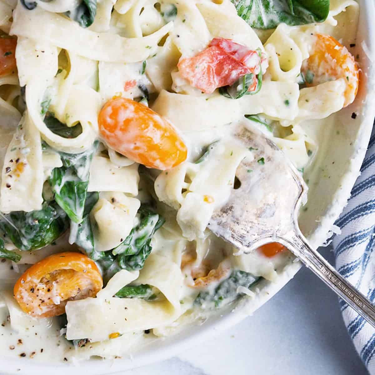Creamy Goat Cheese Pasta with Spinach and Tomatoes Seasons and Suppers