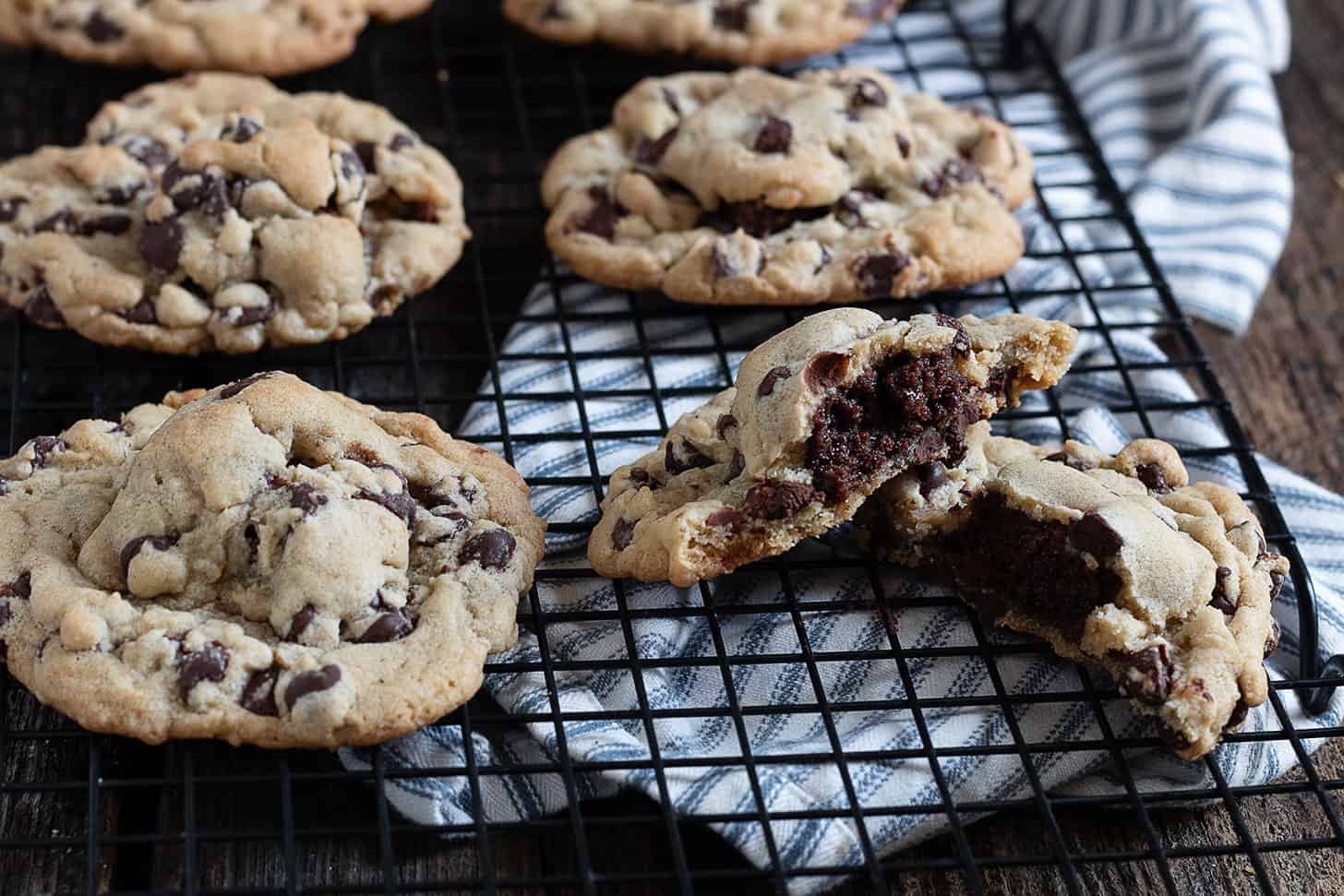 brownie stuffed chocolate chip cookies on cooling rack