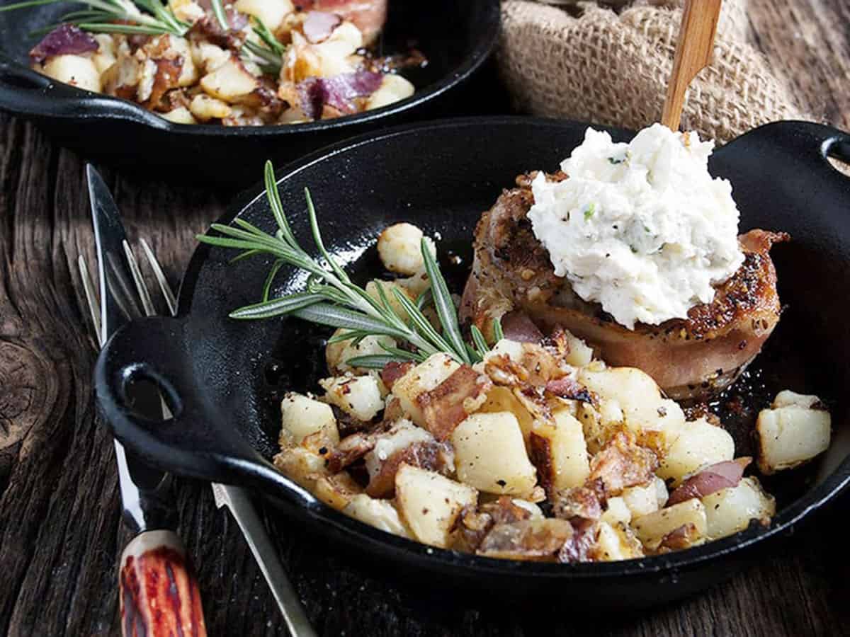 bacon wrapped pork medallions in small skillet