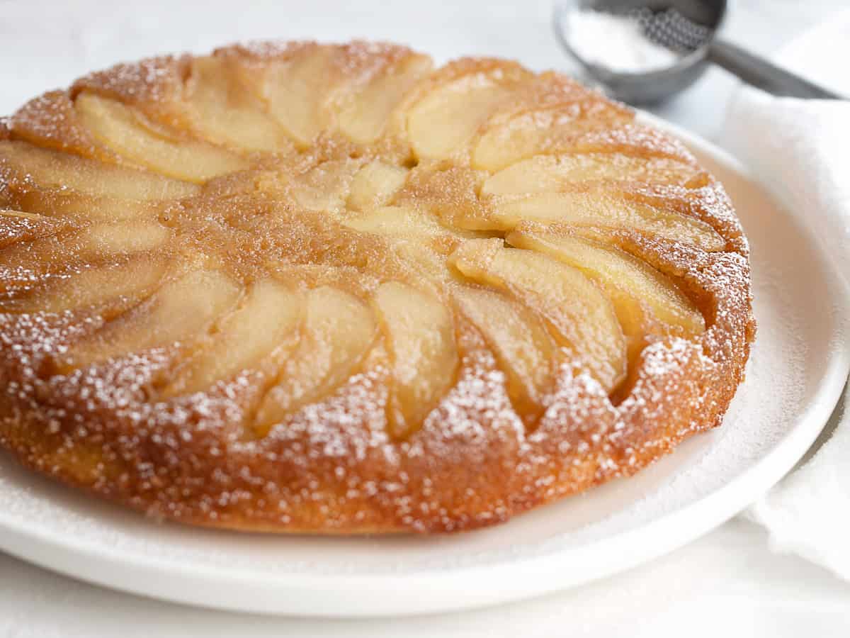 upside-down maple apple cake on white plate