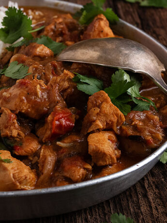 coconut chicken curry on platter with rice