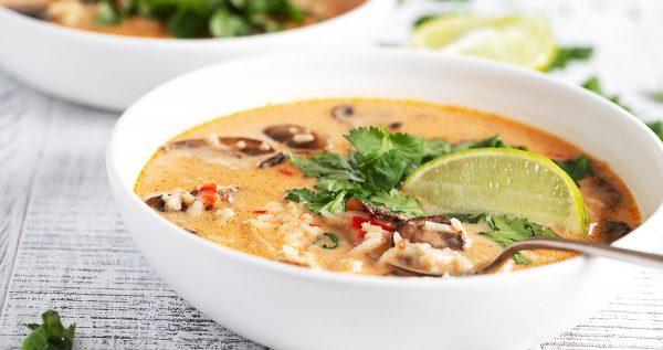 wicked thai chicken soup is white bowls