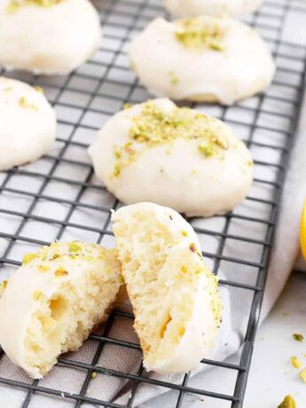 glazed lemon cookies on cooling rack