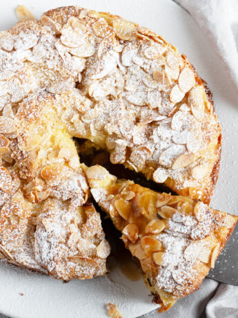 almond bread pudding sliced on plate