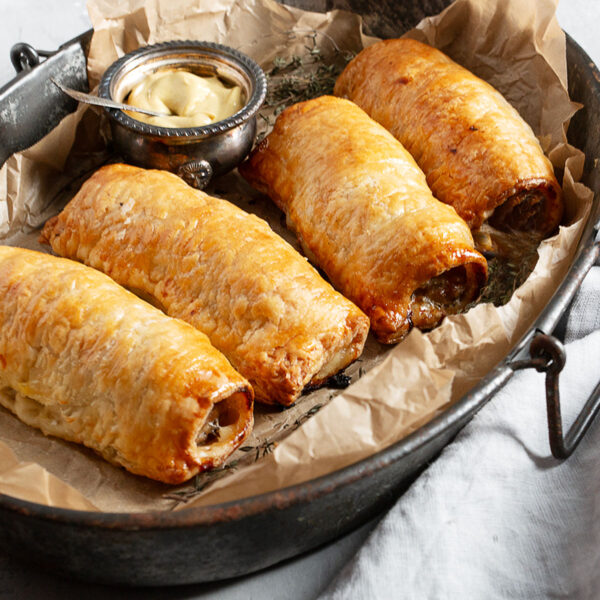 puff pastry sausage rolls in serving dish
