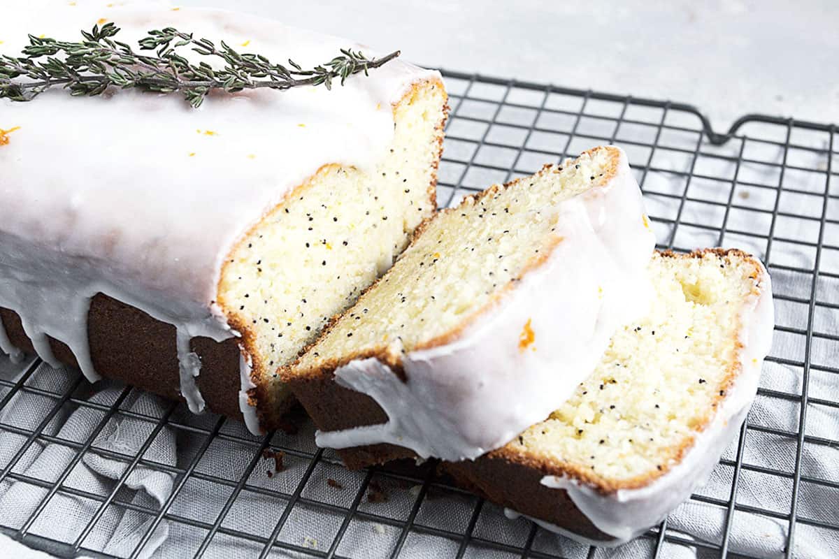 orange poppy seed loaf on cooling rack