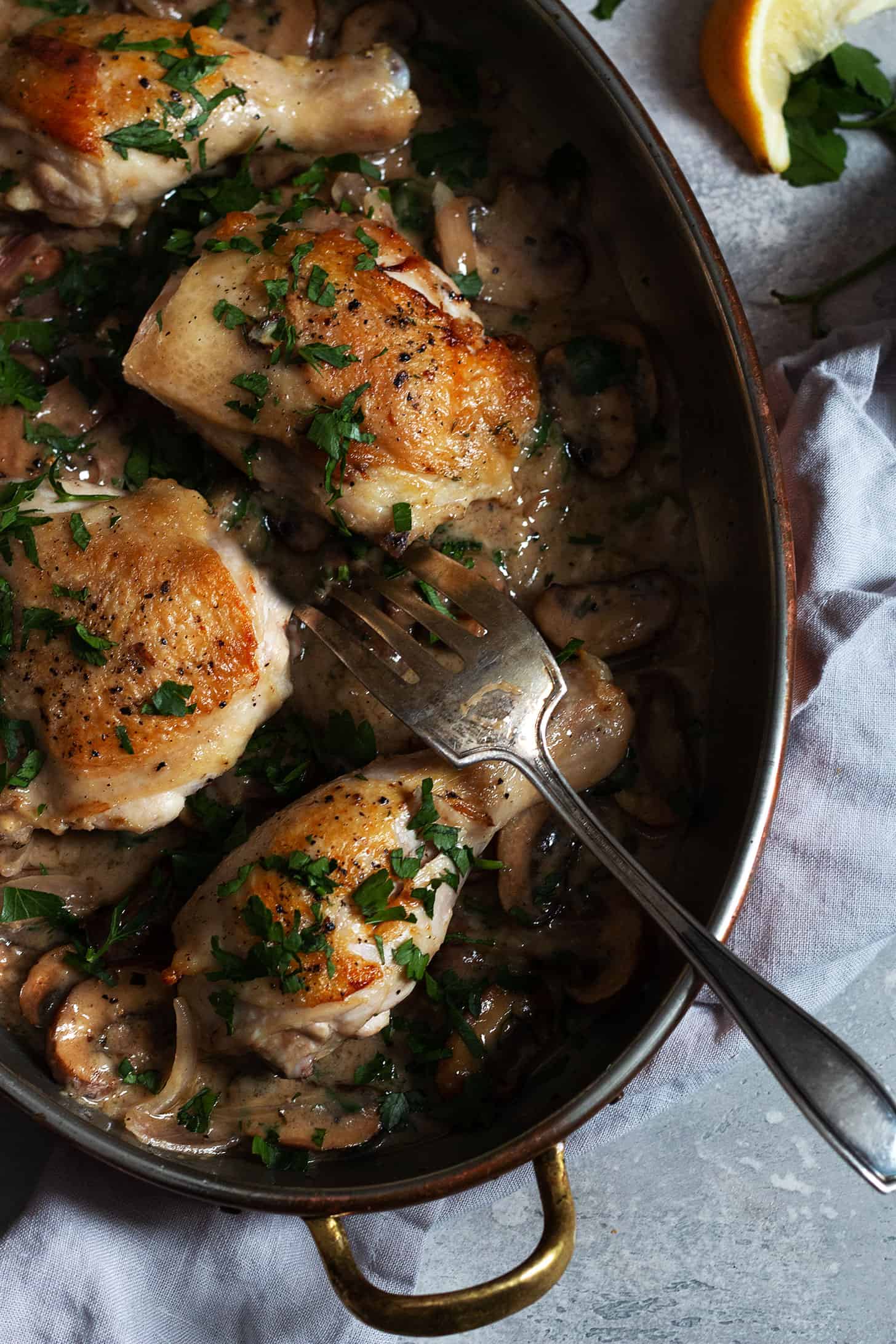 chicken riesling in baking dish with fork
