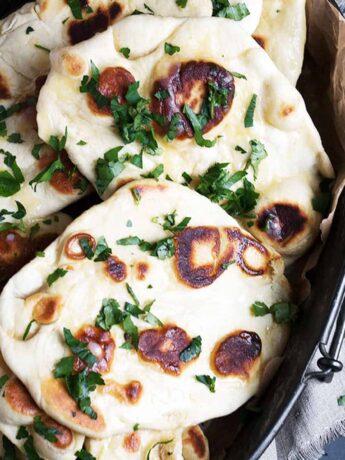 naan bread on metal platter