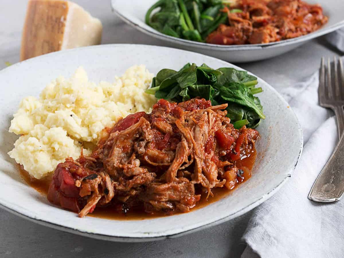 spicy braised pork with mashed potatoes in bowl