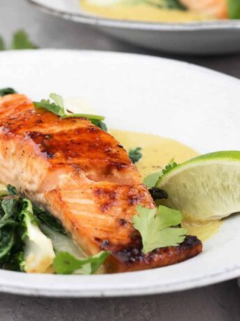 sugar-seared salmon in bowl with coconut lime sauce