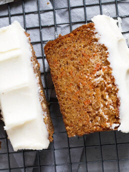 carrot cake loaf with cream cheese frosting sliced