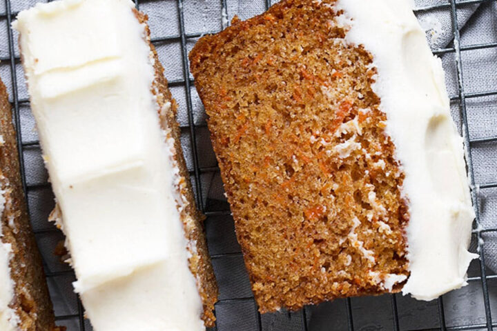 carrot cake loaf with cream cheese frosting sliced