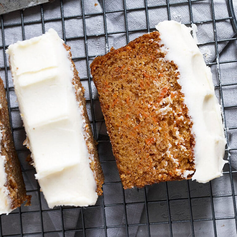 carrot cake loaf with cream cheese frosting sliced