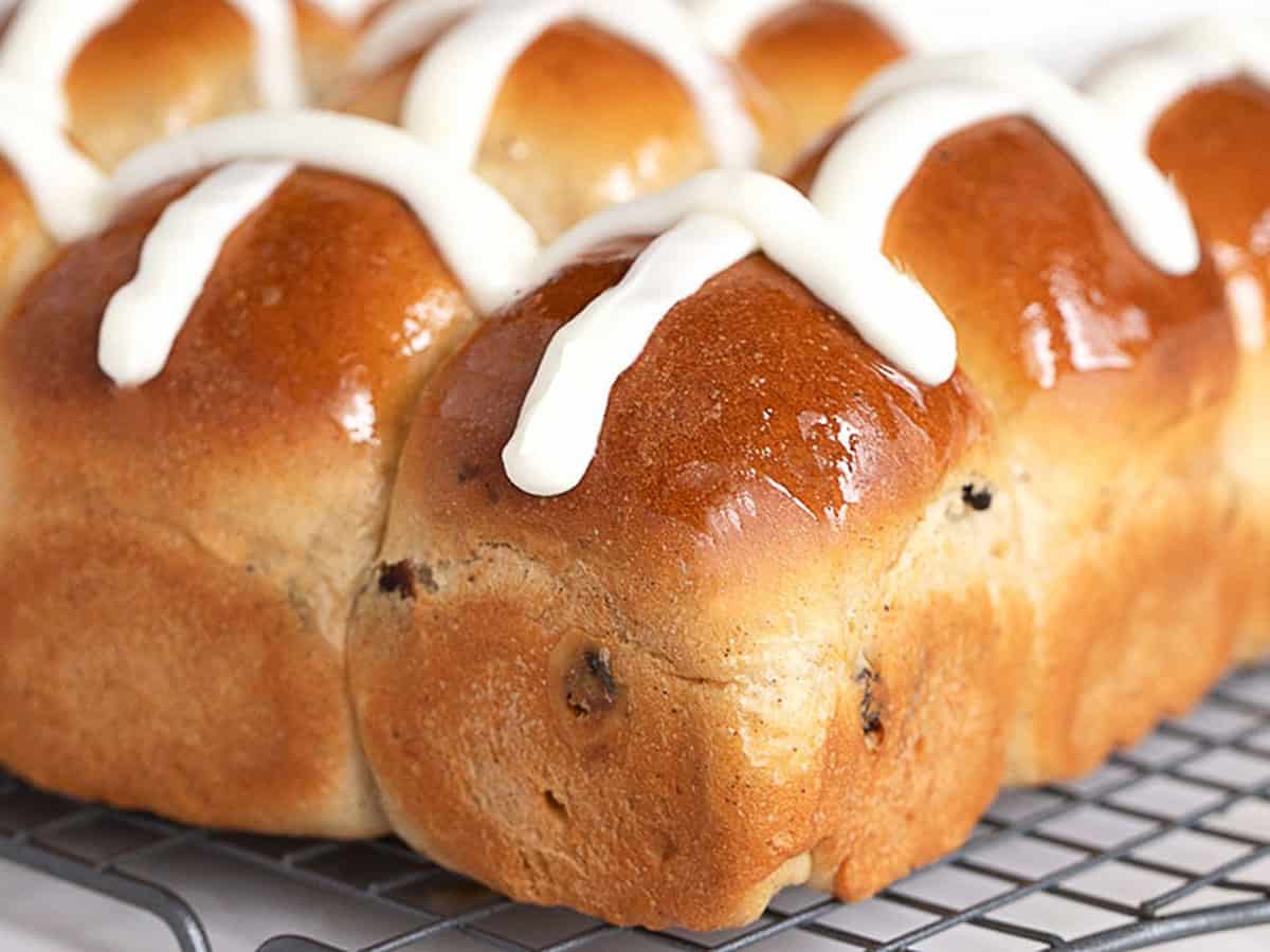 hot cross buns on cooling rack