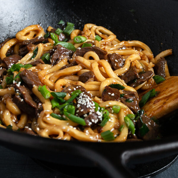 Mongolian Beef Udon in cast iron wok