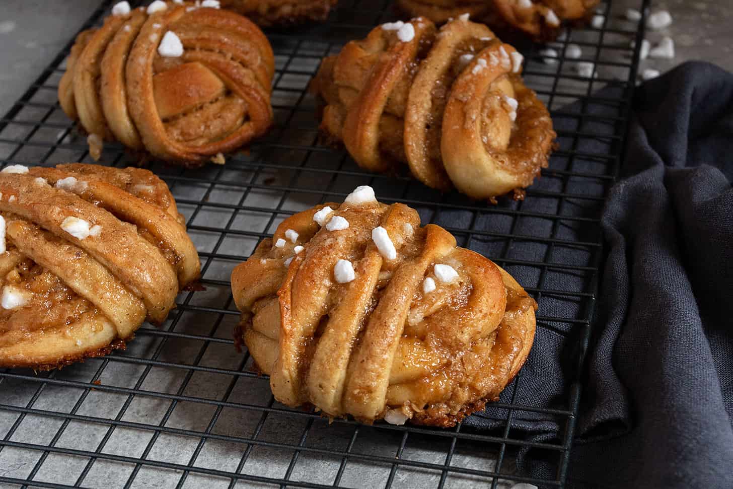 maple walnut rolls on cooling rack