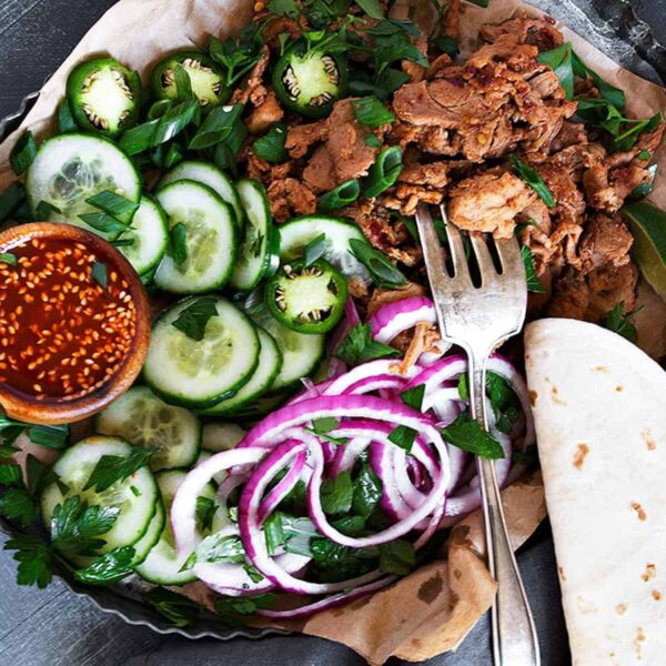 spicy pork tacos on platter