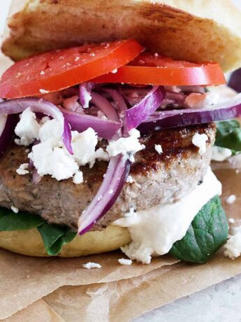 pork souvlaki burger on parchment