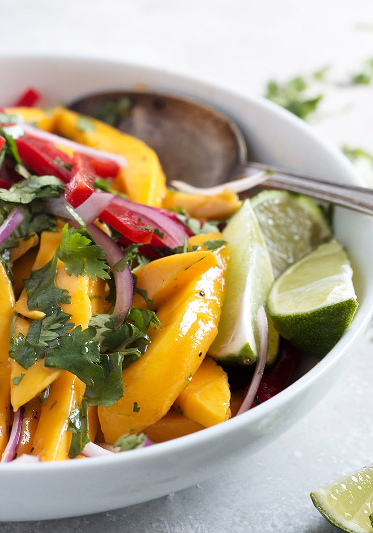 mango salad in white bowl