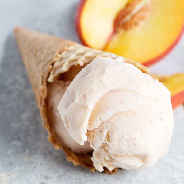 peach ice cream in cone