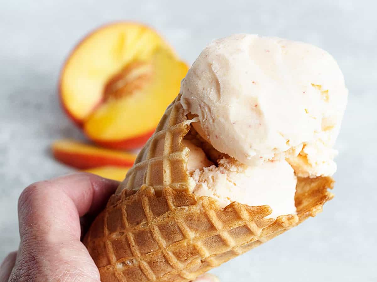 peach ice cream in cone