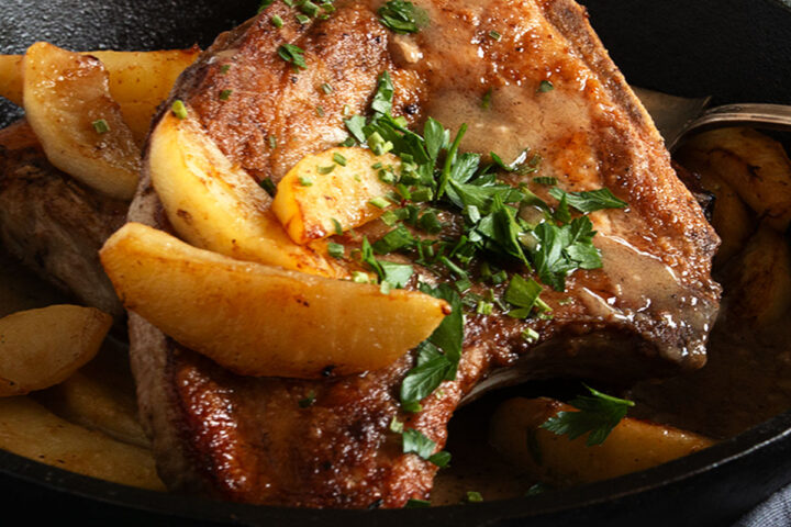 pork chops with apples in cast iron skillet