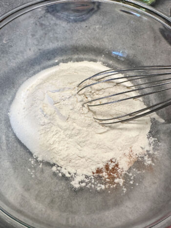 whisking together dry muffin ingredients